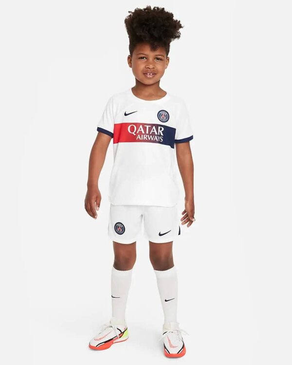 Kids PSG away football kit 2023/24 featuring jersey, shorts, and socks for young fans.