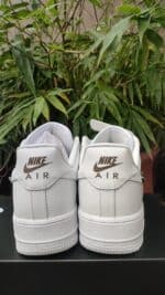 White Nike Air Force Low 1 Molten Metal sneakers for men and women.