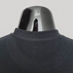 Black Nike Cut Shirt with two-tone design, casual sportswear for men.