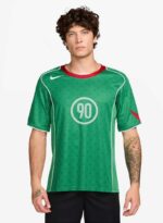 Nike Total 90 green soccer jersey with red accents and number 90 print.
