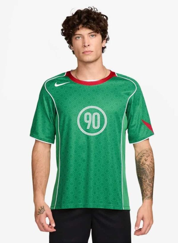 Nike Total 90 green soccer jersey with red accents and number 90 print.
