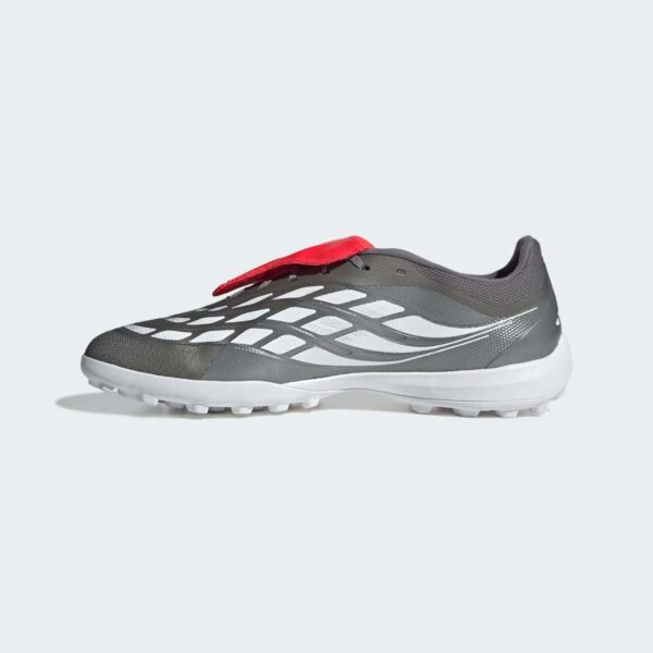 Football shoes with fold-over tongue for optimal grip and comfort.