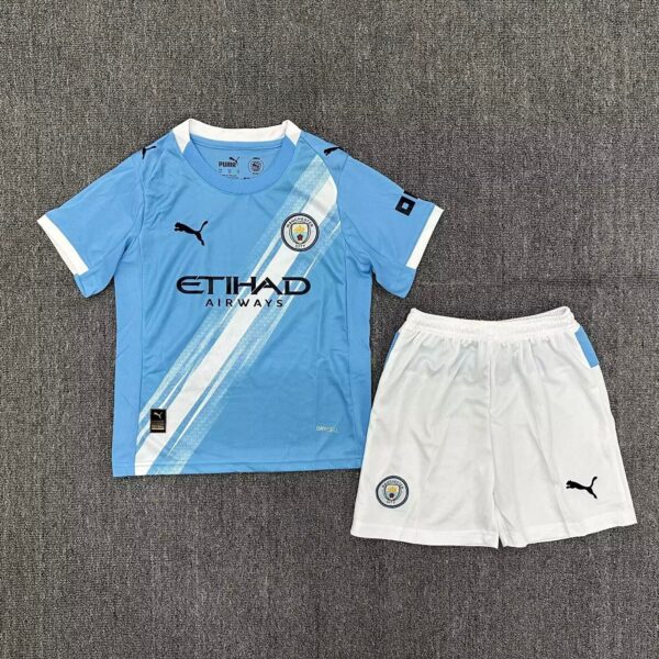 Kids Manchester City home football kit 2025/26 with jersey and shorts.