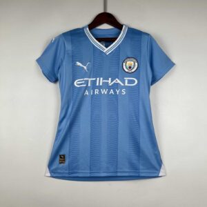 Manchester City Women football jersey 2023/24, authentic blue kit with club logo and sponsor.