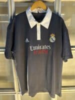 Authentic Real Madrid away football jersey with club crest and Adidas logo.