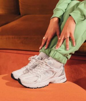 New Balance 530 Munsell white sneakers for men and women. Stylish, comfortable, and lightweight athl.
