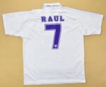Raul 7 Real Madrid football jersey in white with purple lettering and number.