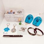 Erling Haaland football fan merchandise set with keychains, wristbands, and accessories.