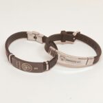 Football fan bracelets featuring Manchester City and Erling Haaland logos, perfect for sports enthus.