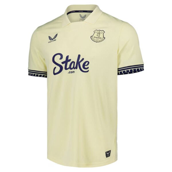 Cream Everton FC soccer jersey with navy Stake sponsor and club crest on the chest.
