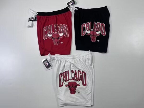Authentic Chicago Bulls fleece shorts in red, black, and white with logo.