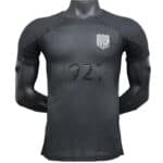 Training jersey for Al-Ittihad football team, 2025/26 season, black color with team crest.