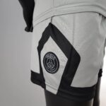 Official PSG kids away football kit 2022/23 for young fans.