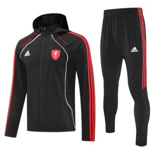 High-quality black football jacket and pants with red accents, perfect for training and matches. Aut.