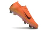 Nike Jr. Mercurial Vapor 16 Pro soccer cleat for youth players, vibrant orange with black accents.