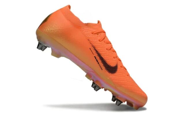Nike Jr. Mercurial Vapor 16 Pro soccer cleat for youth players, vibrant orange with black accents.