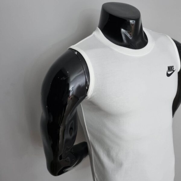 Nike Cut Sleeveless Shirt in White with Black Nike logo.