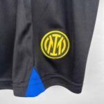 Inter Milan kids' 2023/24 home football jersey with club logo.