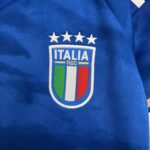 Official Italy national team kids' home football jersey for 2023/24 season.