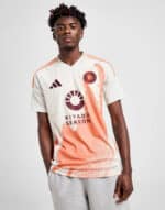Youth soccer jersey featuring bold graphics and team logo, perfect for sports fans.