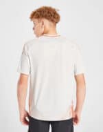 White soccer jersey for men with orange details, lightweight and breathable sportswear.