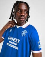 Official Rangers FC 2025/26 home football jersey, blue with white and red accents.