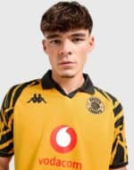 Kaizer Chiefs 2025/26 home football jersey featuring team logo and vibrant yellow design.