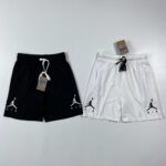 Cotton basketball shorts in black and white with Jordan logo.