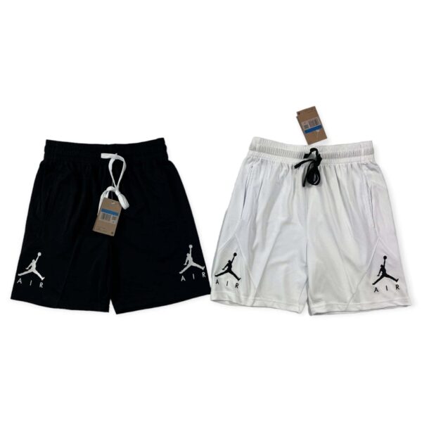 Cotton basketball shorts in black and white with Jordan logo. Comfortable, stylish sportswear for ac.