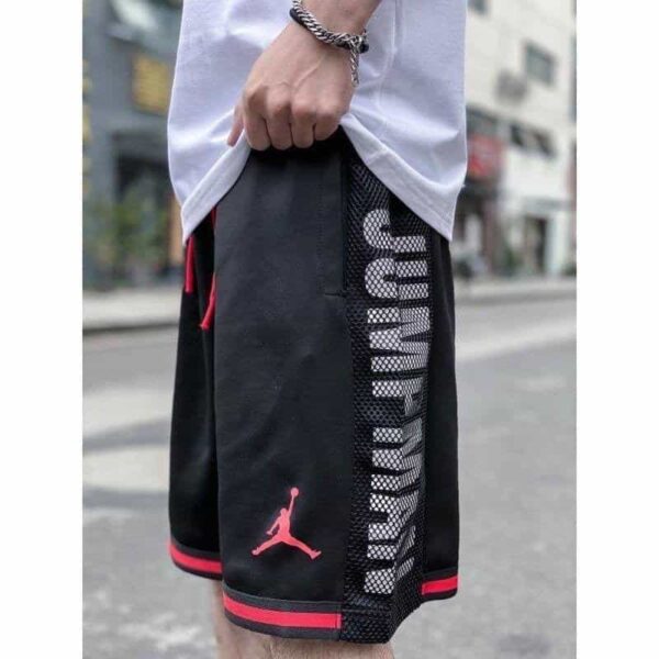 High-quality Jordan Jumpman basketball shorts in black with red accents, featuring breathable fabric.