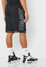 Jumpman basketball shorts with bold logo, black color, and red accents. Perfect for sports and casua.