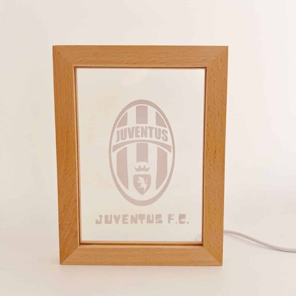 Frame with Juventus logo and team branding.