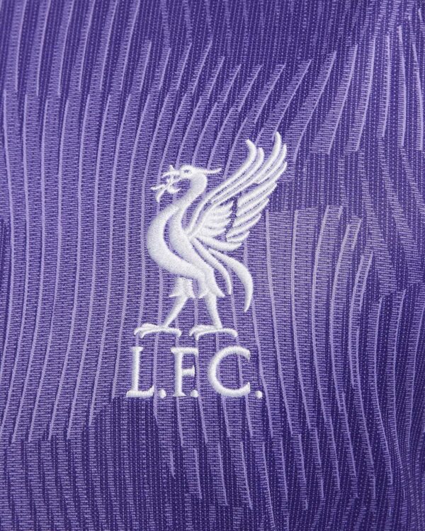Liverpool FC third jersey 2023/24 with purple color and club crest.