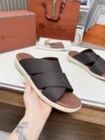 Comfortable black and brown slide sandals for women. Perfect for casual wear and summer outings.