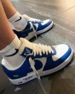 High-quality Louis Vuitton x Nike Air Force 1 Low Royal sneakers in blue and white.