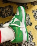 LV x Nike Air Force 1 Low white green sneakers with stylish design.