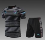 Man City 2022/23 training jersey and shorts, authentic sportswear for football training.