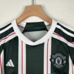 Official Manchester United away football kit for kids 2023/24 season.