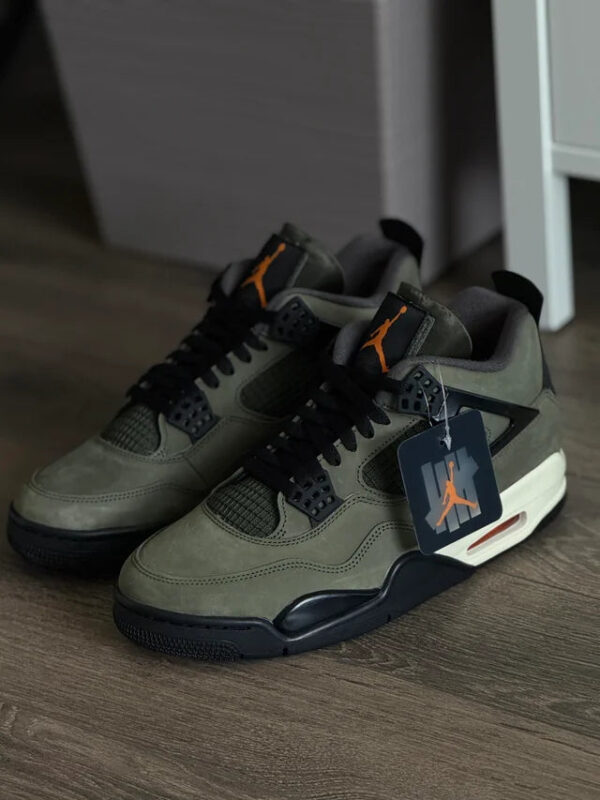 Air Jordan 4 Retro "UNDEFEATED" basketball shoes with black and olive green colorway.