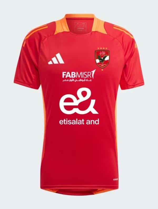 Red Al Ahly training jersey with team crest and sponsor logos, perfect for fans and players.