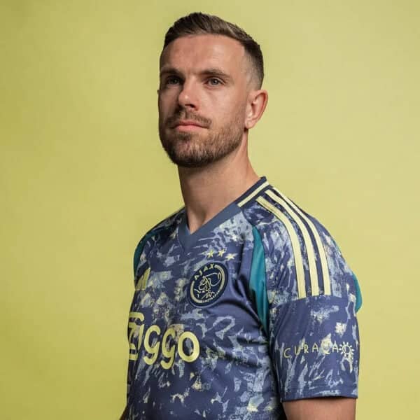 AJX Away jersey 2024/25 with team logo and vibrant design.