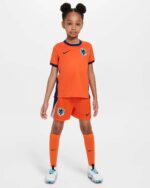 Kids Netherlands 2024 home football kit with orange jersey and shorts, featuring team crest and Nike.