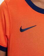 Netherlands kids 2024 home football kit with Nike logo, orange jersey with navy accents.