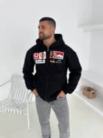 Comfortable oversized hoodie with F1-inspired racing patches, perfect for streetwear fans.