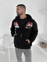 Oversized racing hoodie with padded design, inspired by Formula 1, perfect for streetwear fans.