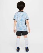 Portugal away kids football kit 2024, featuring a blue patterned jersey and black shorts. Perfect fo.