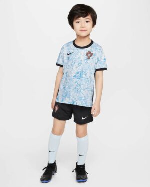 Portugal away kids football kit 2024, featuring team crest, Nike logo, and stylish design for young.