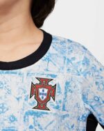 Portugal Away Kids Kit 2024, authentic football jersey with team crest, perfect for young fans.