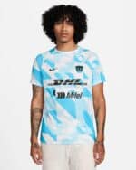 Pumas UNAM third football jersey 2024 with blue and white geometric design.