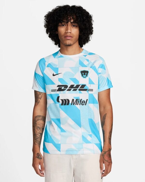 Pumas UNAM third football jersey 2024 with blue and white geometric design.